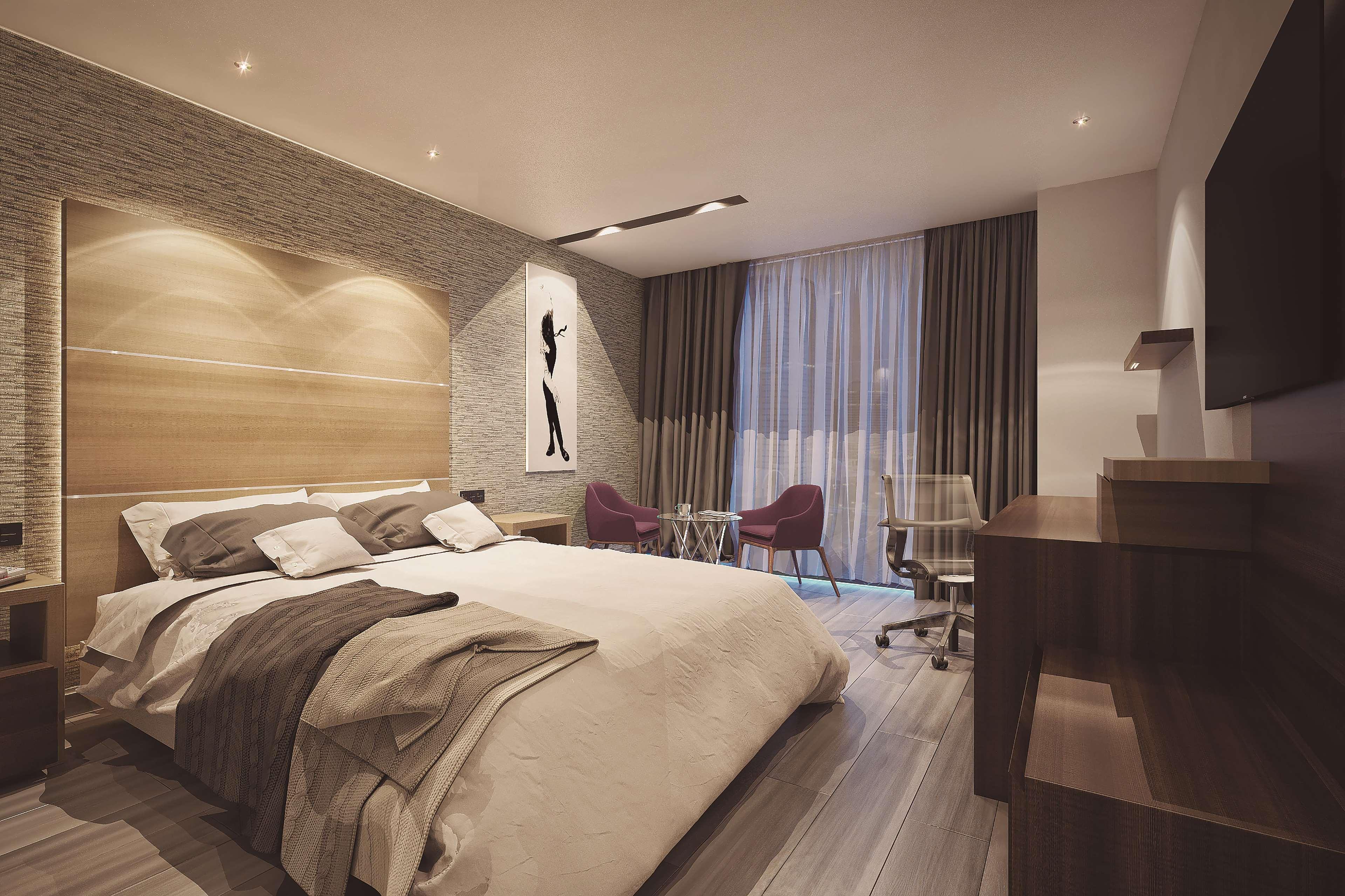 ホテル Camino Real Fashion Drive Monterrey サン・ペドロ・ガルサ・ガルシーア エクステリア 写真 A bedroom