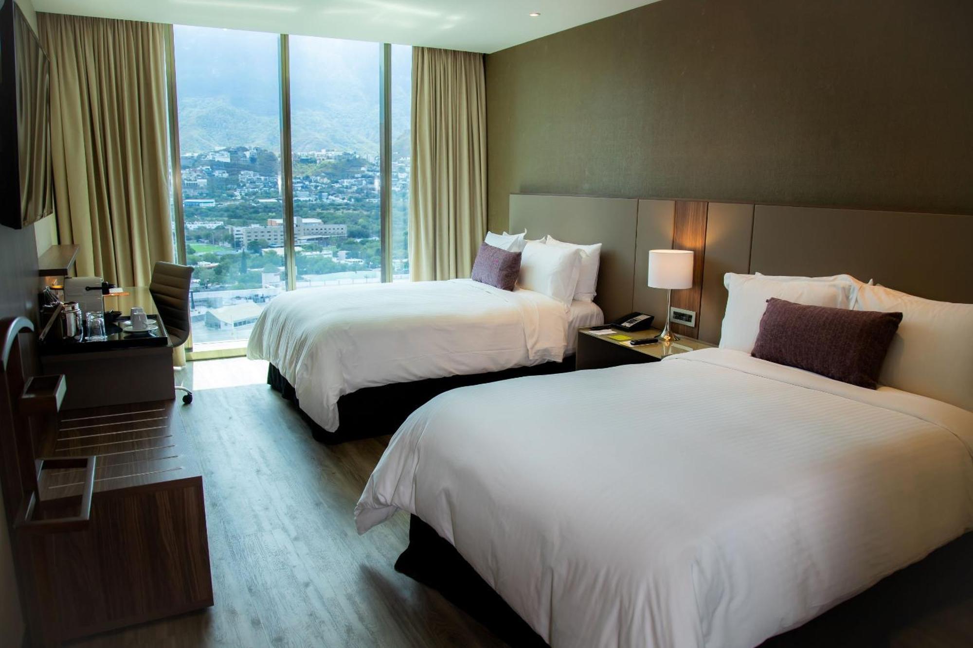 ホテル Camino Real Fashion Drive Monterrey サン・ペドロ・ガルサ・ガルシーア エクステリア 写真 A room at the hotel